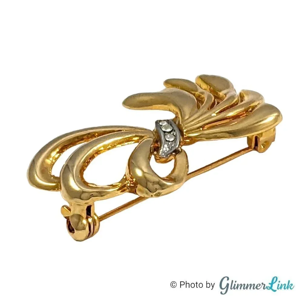 Vintage Gloria Vanderbilt Rhinestone Bow Brooch Gold Tone